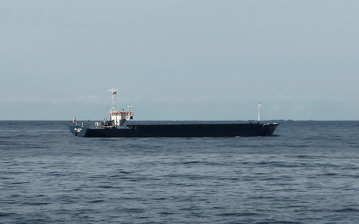 445b